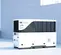 White Generac hydrogen powered fuel cell parked next to a building
