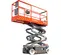 Side angled view of an orange and gray scissor lift, partially extended with safety railing.