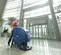Blue Nilfisk Battery Powered 28 inch Walk-Behind Floor Scrubber