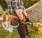 Orange, black, white and silver STIHL Brush Cutter, Gas Powered