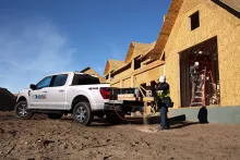 Ford truck outside residential construction site