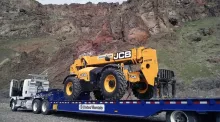 Forklift in front of the mountains