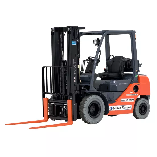 Front angled view of an orange and black Toyota warehouse forklift with a black mast, orange forks and an open cabin.