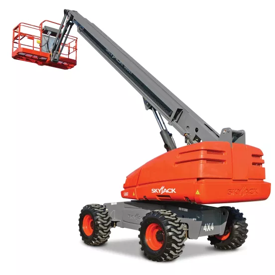 Rear angled view of orange and gray Skyjack boom lift with extended arm and basket.