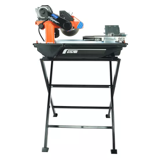 Orange and black Norton tile saw on stand